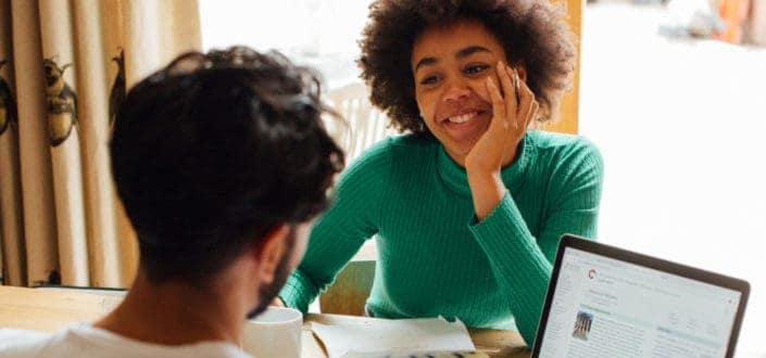 Girl admirably staring at her male coworker