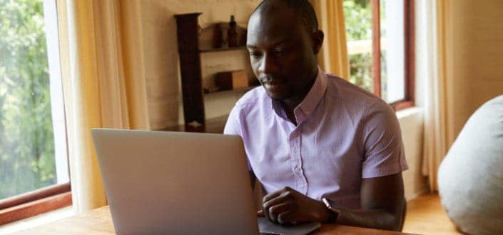 man working on his laptop