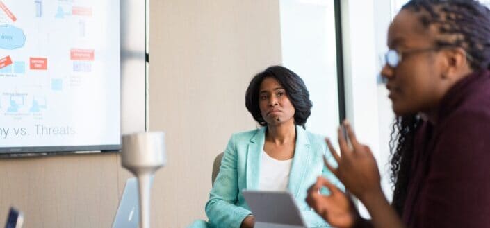 Woman looking at an office worker