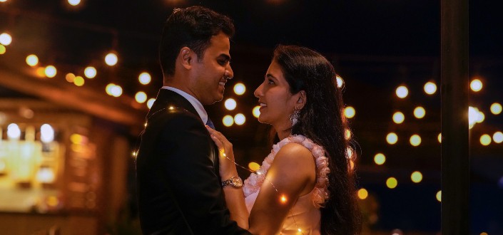 man and woman staring at each other while dancing