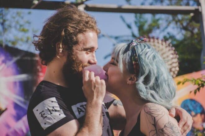 A couple eating cotton candy together - candy trivia