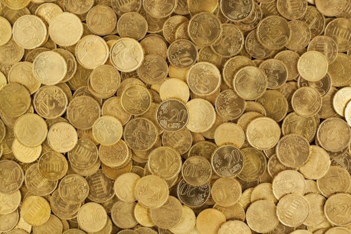 gold coins on a flat surface