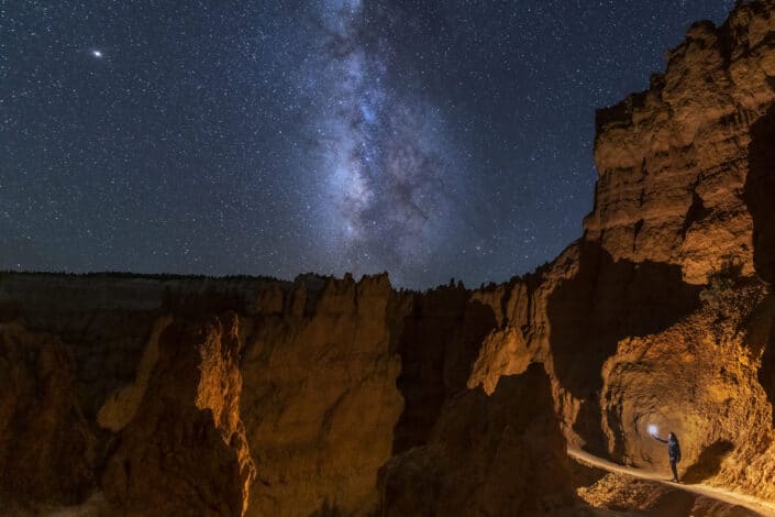 Milky Way galaxy photo against canyons