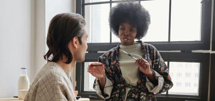 A man and woman talking to each other