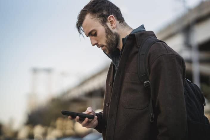 Man texting on his phone