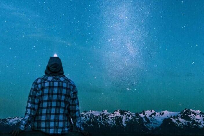 A person looking at the night sky.