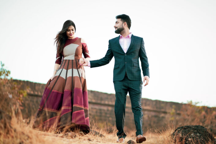 A dressed-up couple walking together