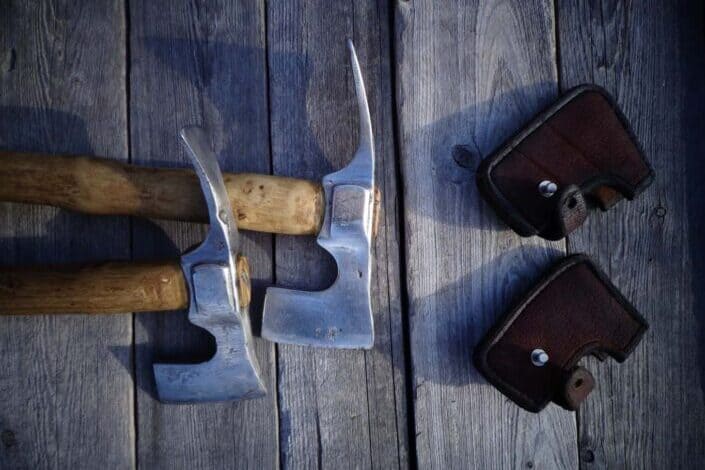 A pickel, axe, and a pickaxe