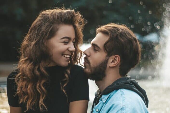 Couple smiling at each other