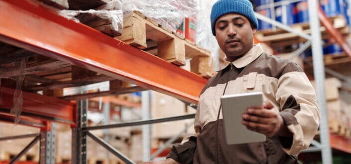 man holding digital tablet