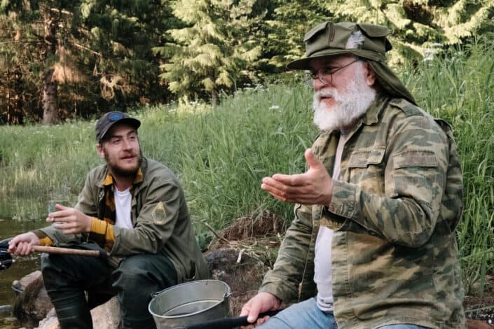 Father and son spending time together, fishing.