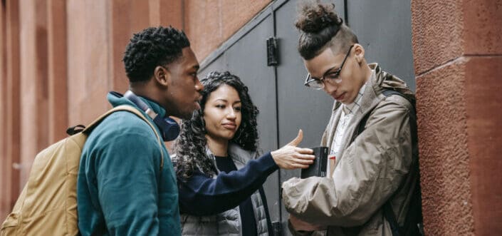 Three friends having a deep conversation