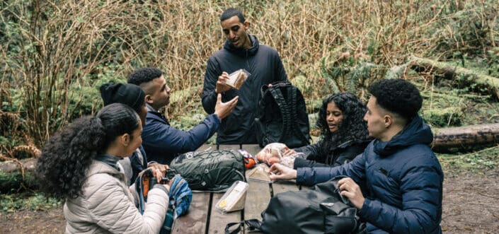 Friends having a snack break outdoors