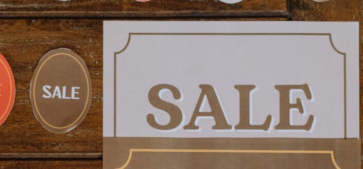Card with a sale label.