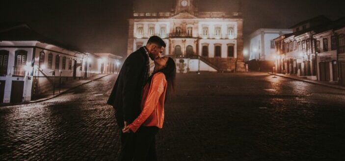 Couple kissing in the streets