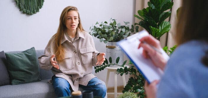 Woman answering to her interviewer