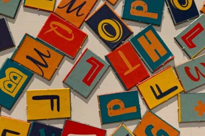 Letters written on random pieces of squared board