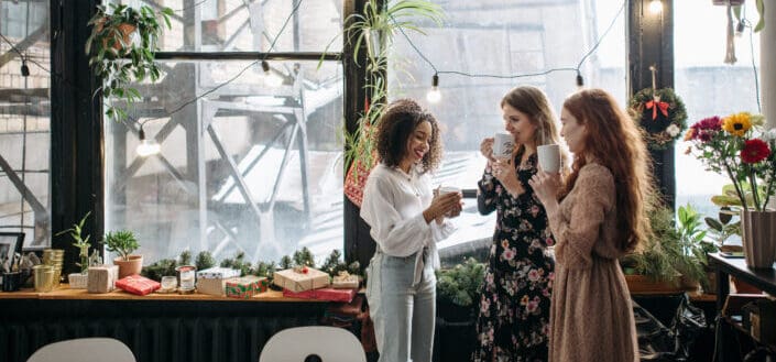 3 Women Drinking Hot Coffee