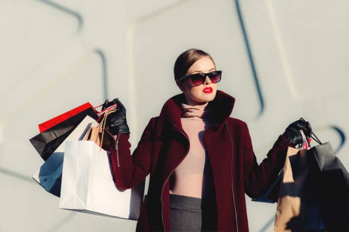 Woman holding a number of shopping bags