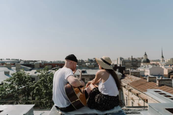 Man playing a song to his girl