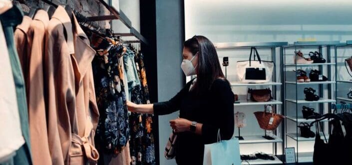 Woman shopping some clothes.