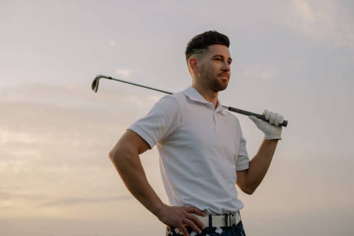 man holding a golf club