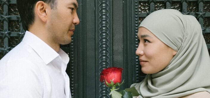 Muslim couple romantically staring at each other