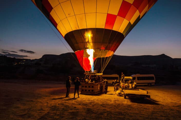 People Standing Near a Hot Air Balloon