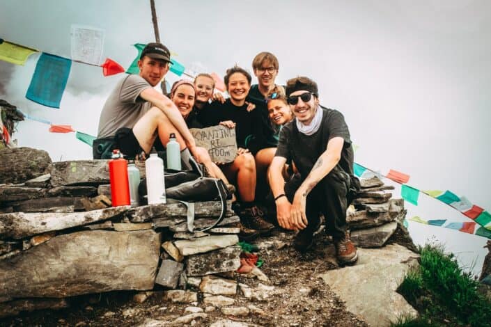 group of people smiling at the camera