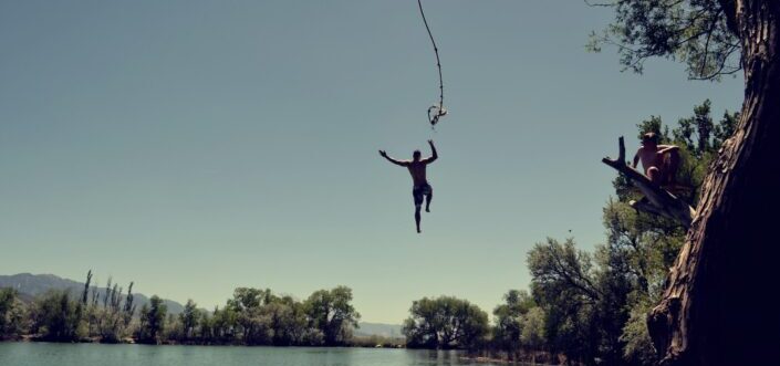 Man lake jumping through a rope.
