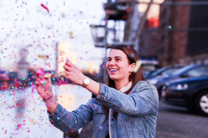 Woman enjoying the confetti