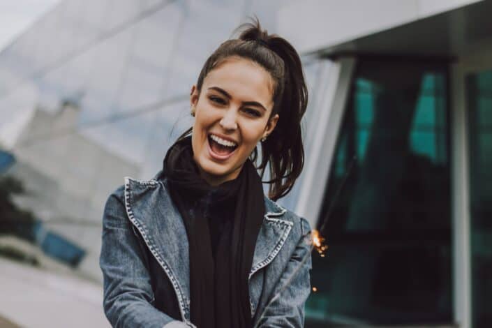 woman wearing gray denim jacket