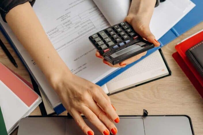 Woman computing over finances