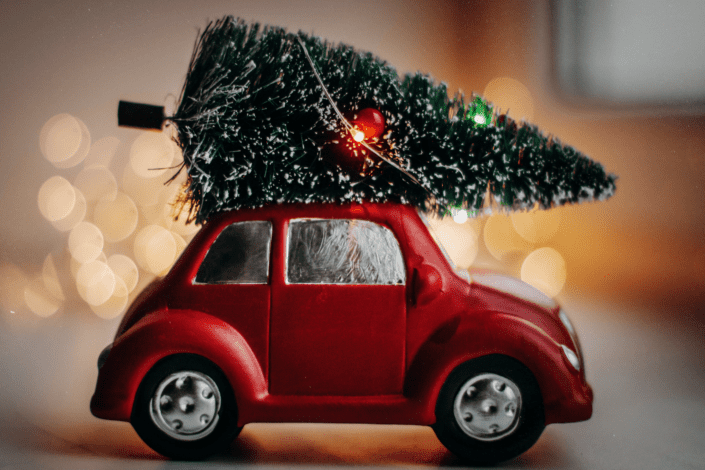 red car with Christmas tree on top