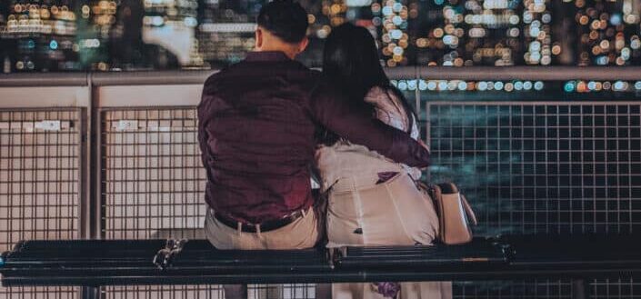 Couple Looking at the View at Night