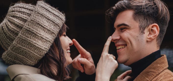 Couple Laughing While Touching Each Others Noses 