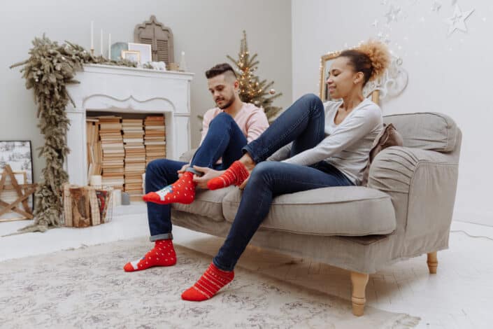 Couple Wearing Red Socks Together