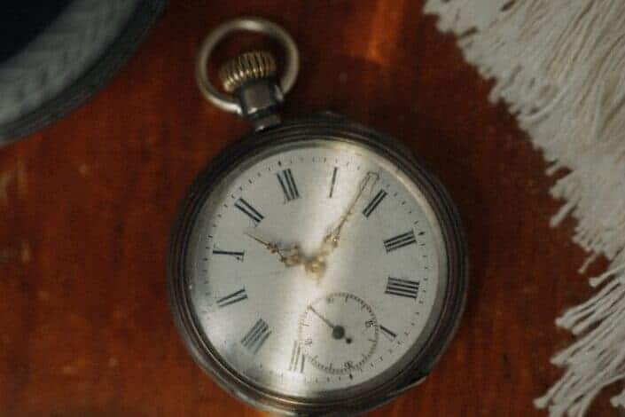 Vintage pocket watch on a table