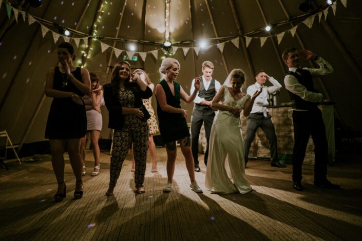 Adults Dancing At A Wedding Party