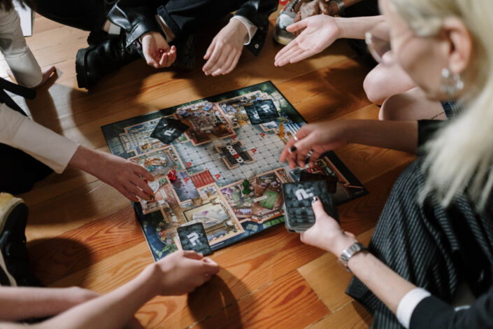 a-group-of-people-playing-a-board-game-stockpack-pexels