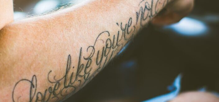 Tattoo About Love on a Person's Arm