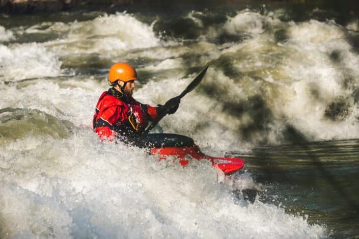 man-on-red-watercraft-stockpack-pexels