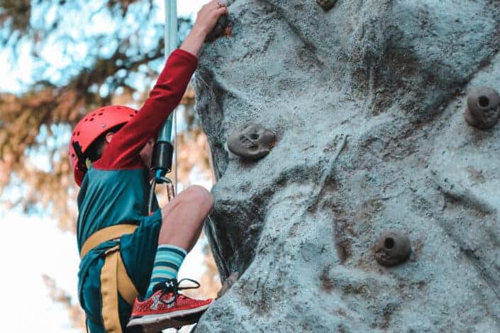 person-climbing-on-gray-rock-stockpack-pexels