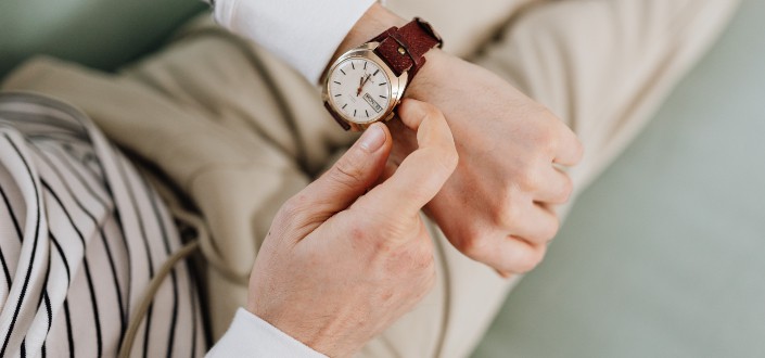 Man checking the time at his watch