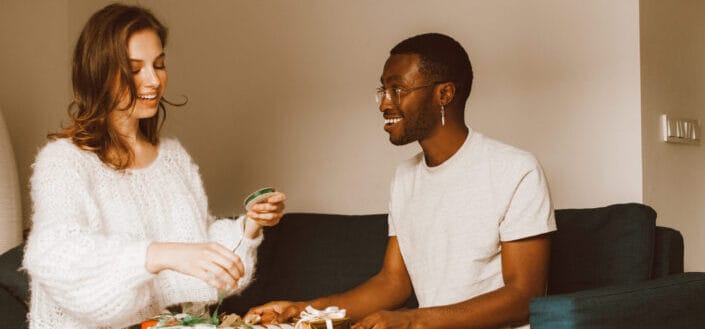 a-man-and-woman-sitting-on-the-couch-while-having-conversation-stockpack-pexels