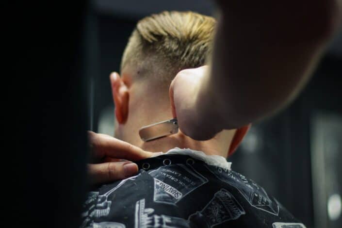 Person Shaving Man's Hair 