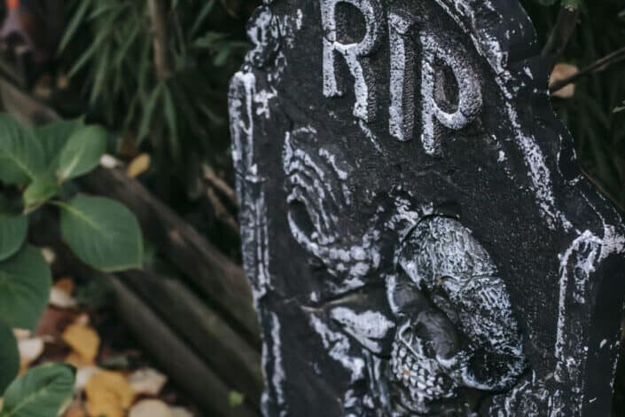 Fake gravestone placed as decoration for halloween celebration