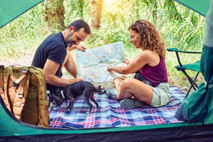 Middle age couple of hiker camping at the forest