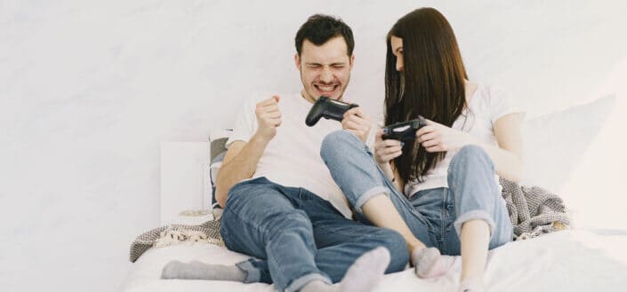 Couple playing video games together