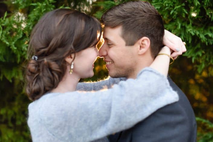 Couple in formal attire hugging